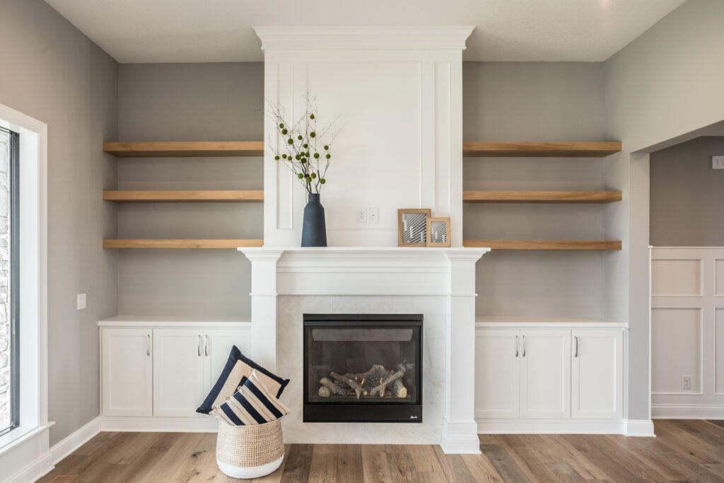 clive iowa custom built-in shelves and fireplace