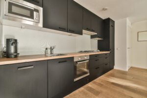 Kitchen with minimalist style cupboards